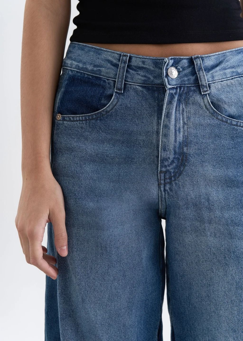 Jeans con recortes - foto 3